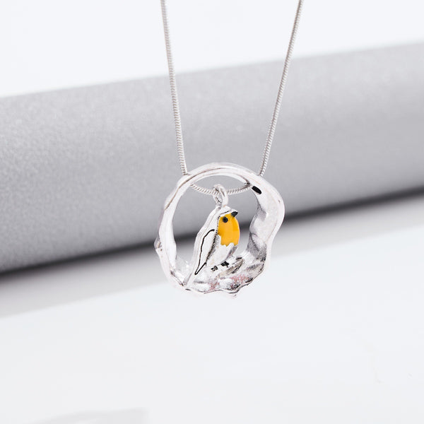 Fashion Creative Bird Hollow P. pendant Necklace front packet. 